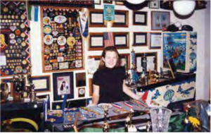 A young Rhode poses in her trophy room